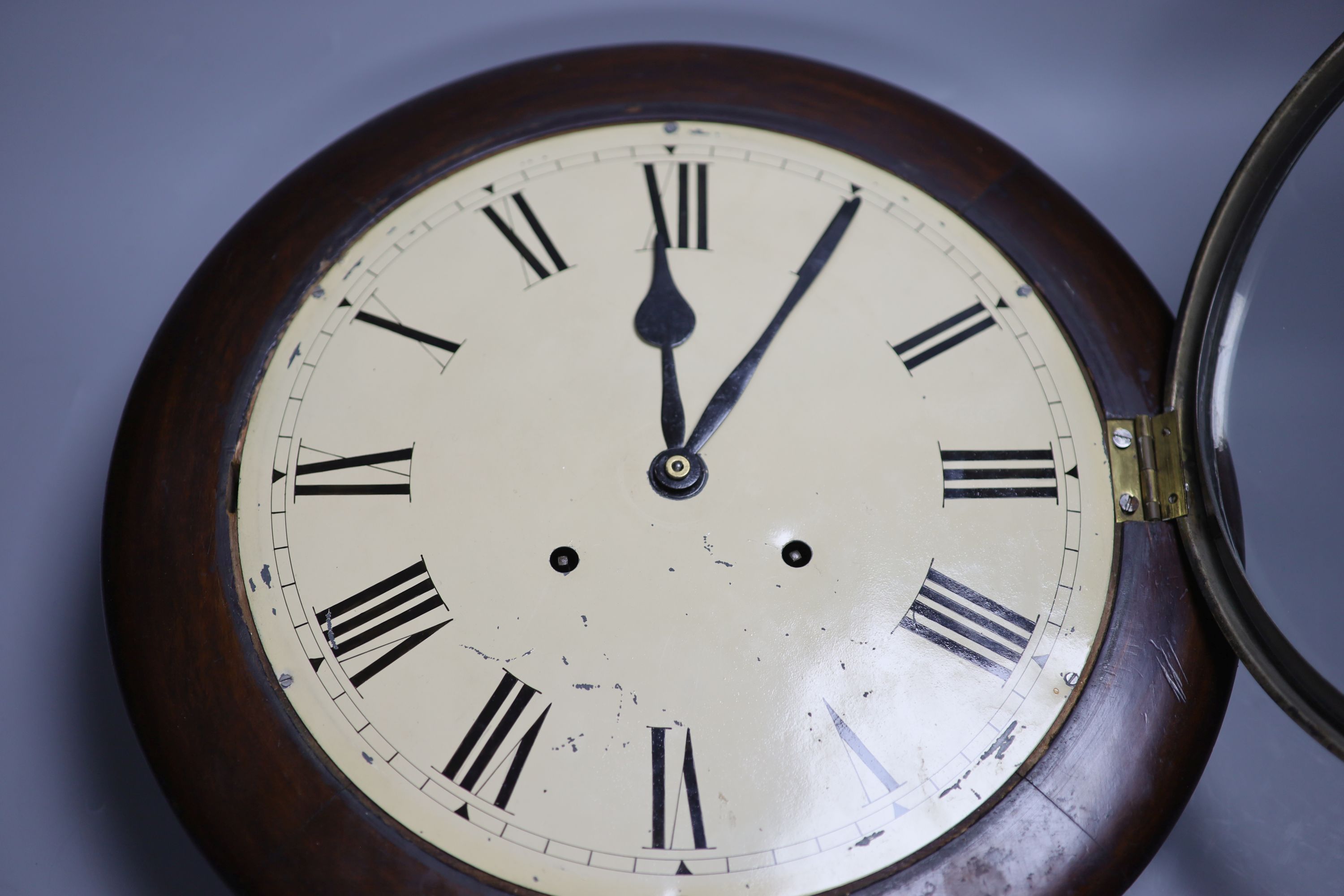 A Victorian mahogany circular wall clock